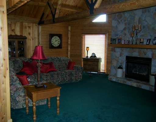 1435 Patterson Road New Castle, PA 16101 - Photo 6 of 8 Living Room. LOOK UP TO FIND A STUNNING 2 STORY CEDAR CATHEDRAL CEILING