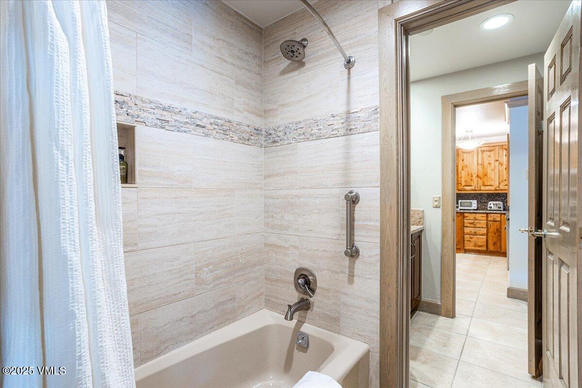 46 Avondale Lane, Unit R312 Beaver Creek, CO 81620 - Photo 20 of 47 a bathroom with a shower