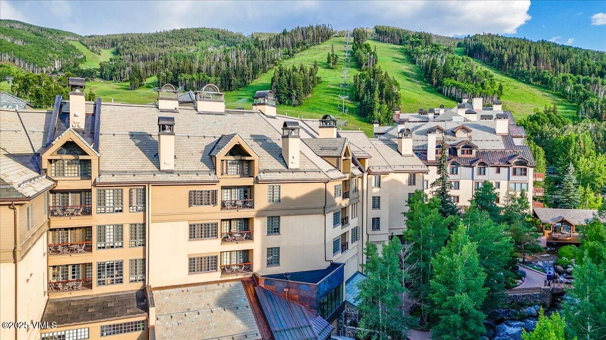46 Avondale Lane, Unit R312 Beaver Creek, CO 81620 - Photo 2 of 47 a view of a city with tall buildings