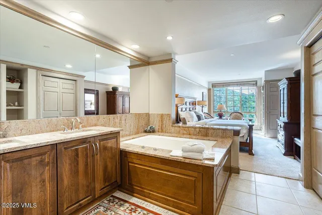 a view of a kitchen area with furniture and a window