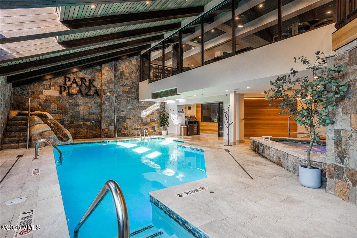 46 Avondale Lane, Unit R312 Beaver Creek, CO 81620 - Photo 43 of 47 a view of a swimming pool with a patio