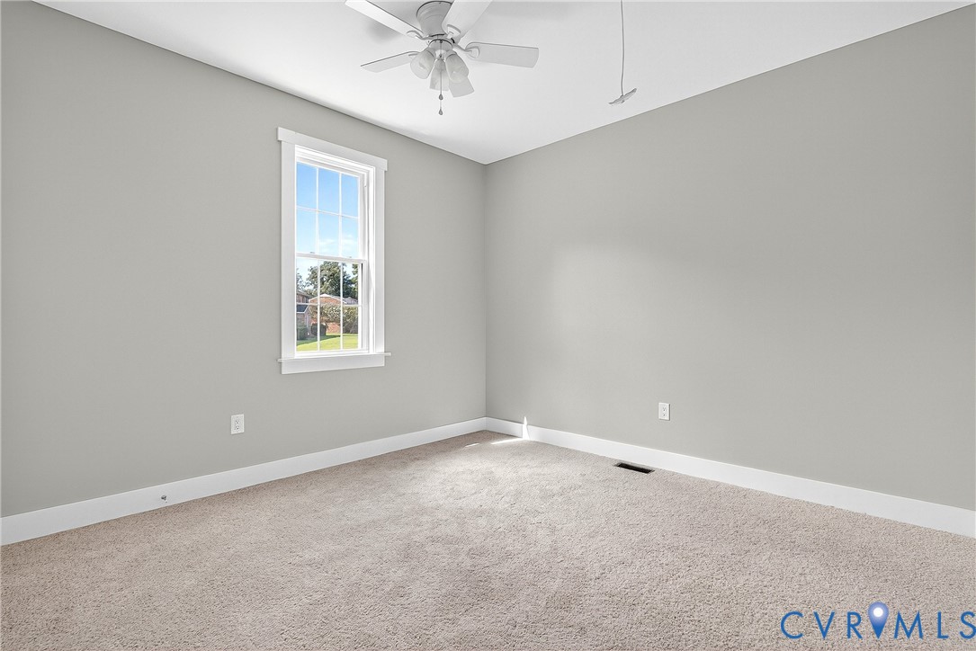 2732 Venter Road Aylett, VA 23009 - Photo 13 of 32 a view of an empty room with a window