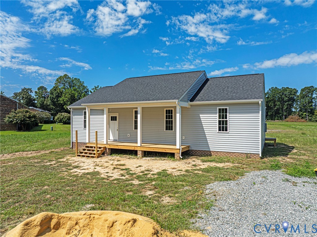 2732 Venter Road Aylett, VA 23009 - Photo 22 of 32 a house with yard in front of it