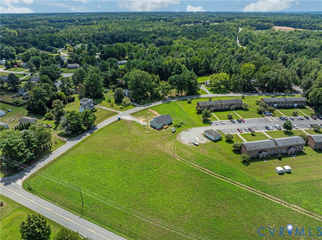 2732 Venter Road Aylett, VA 23009 - Photo 30 of 32 a view of a golf course with chairs
