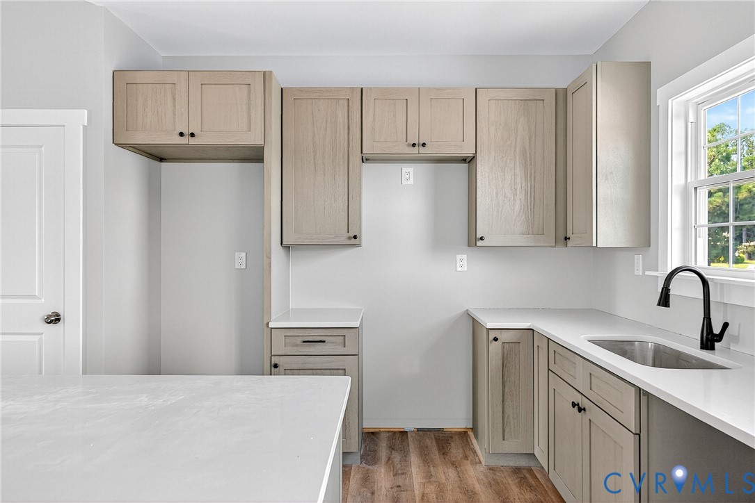 2732 Venter Road Aylett, VA 23009 - Photo 9 of 32 a kitchen with stainless steel appliances white cabinets and a refrigerator