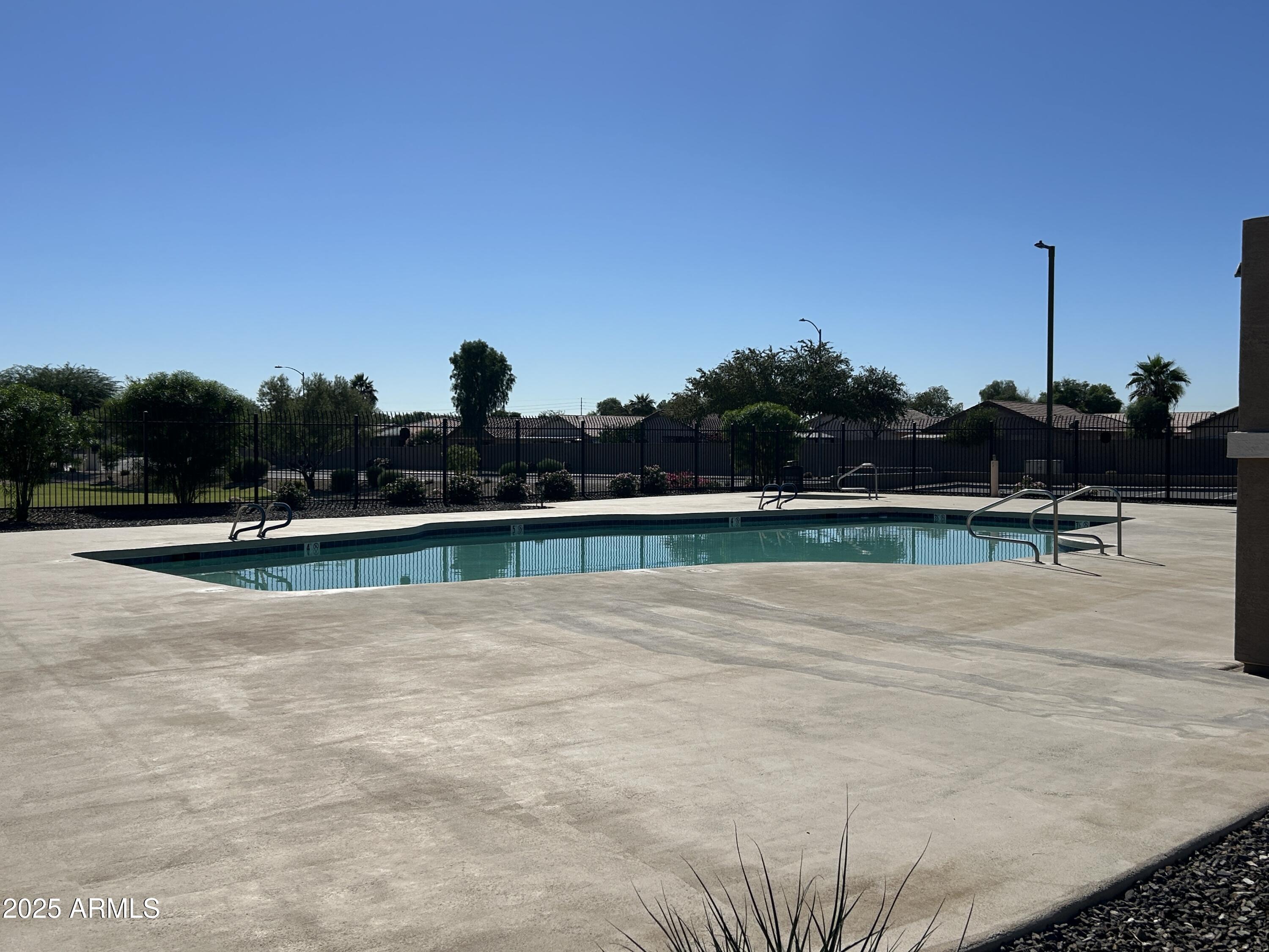 15011 West Redfield Road Surprise, AZ 85379 - Photo 15 of 16 a view of swimming pool with outdoor space