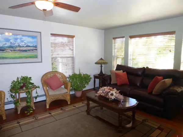 a kitchen with a sink stove top oven and cabinets