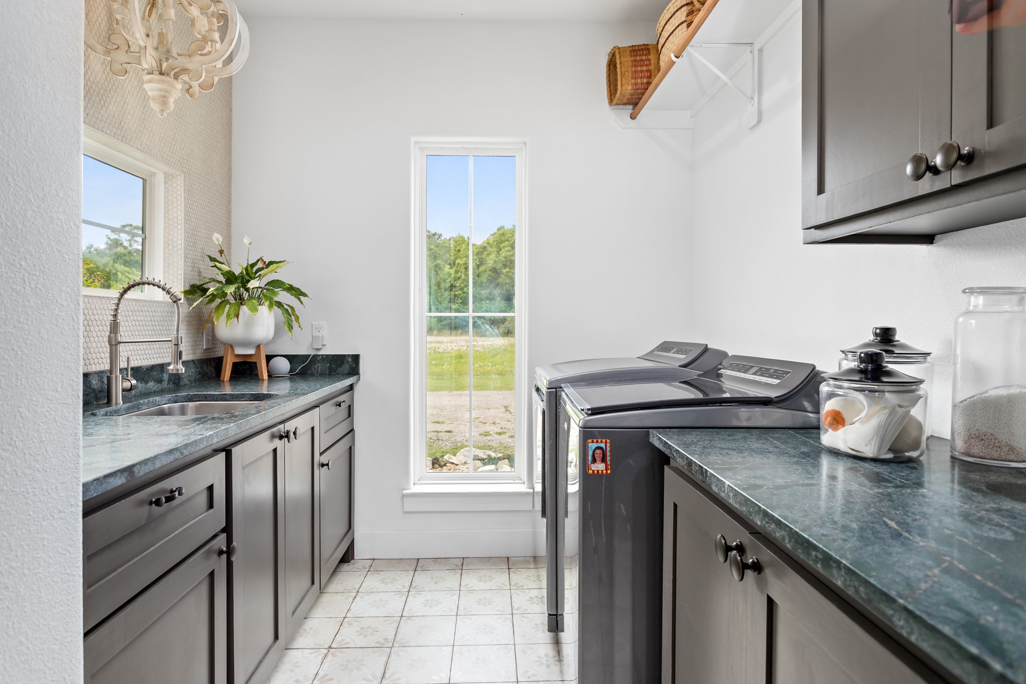 10573 Cooks Lake Road Lumberton, TX 77657 - Photo 28 of 47 a kitchen with granite countertop a sink a stove and a wooden floor