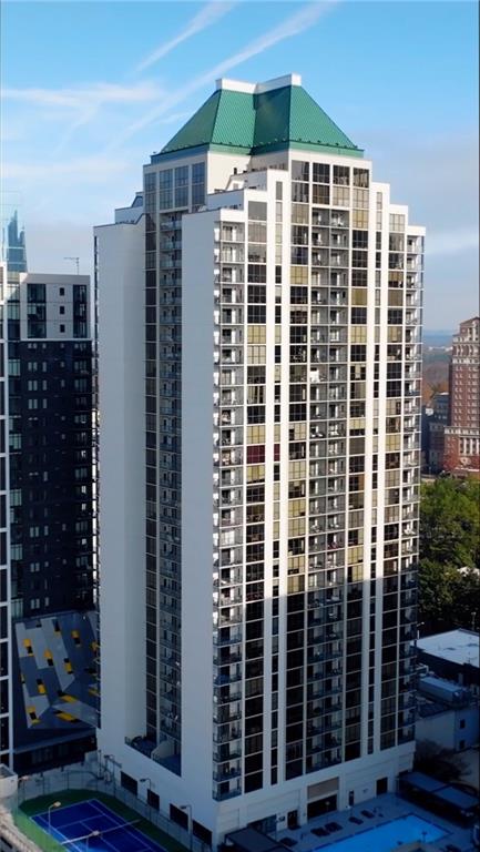 1280 West Peachtree Street Northwest, Unit 3806 Atlanta, GA 30309 - Photo 18 of 35 a front view of a building with glass windows