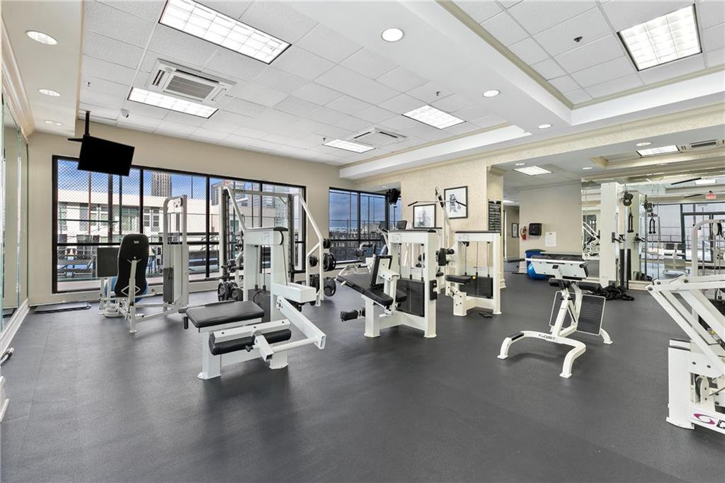 1280 West Peachtree Street Northwest, Unit 3806 Atlanta, GA 30309 - Photo 28 of 35 a view of a room with gym equipment
