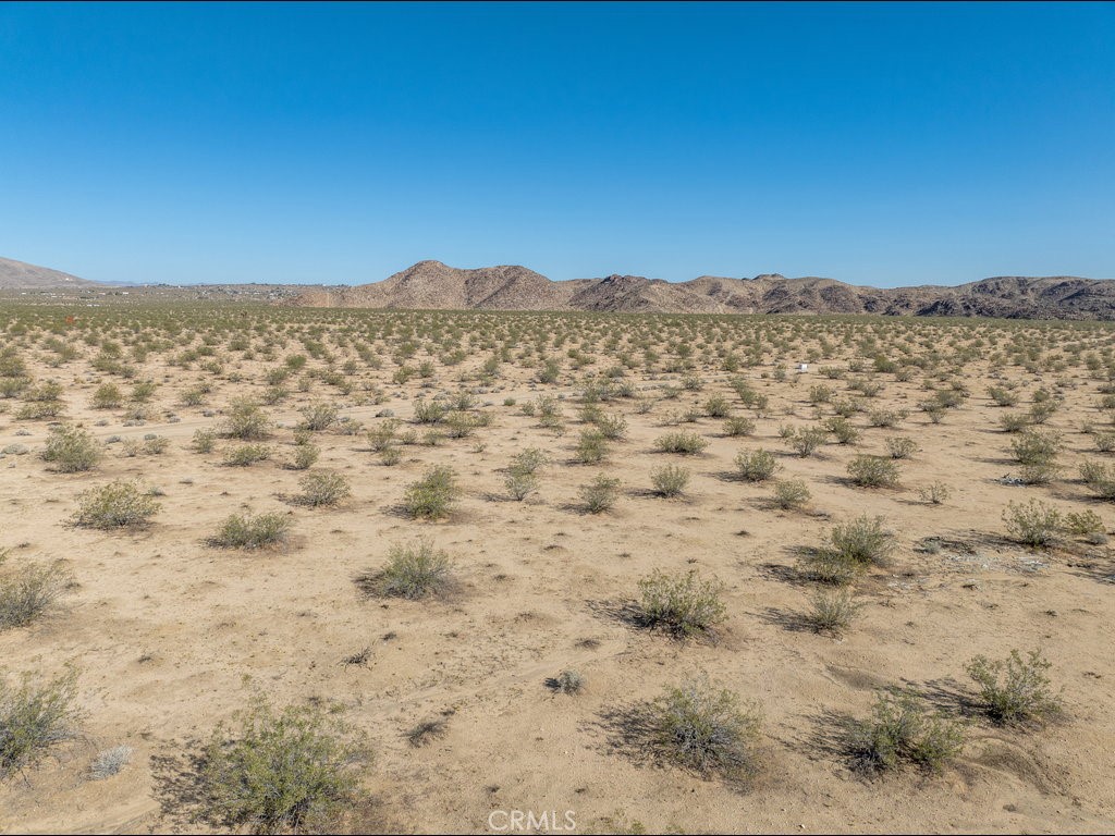 4773 California Avenue Joshua Tree, CA 92252 - Photo 11 of 14 a view of a large body of water with a building in the background