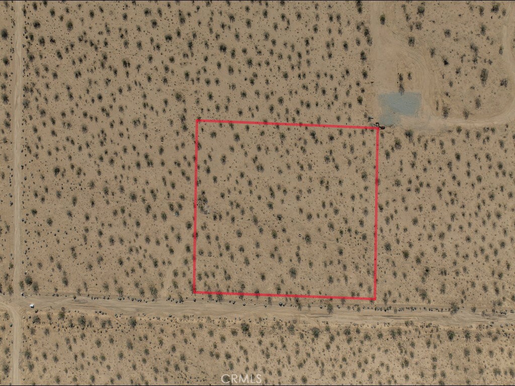 4773 California Avenue Joshua Tree, CA 92252 - Photo 6 of 14 a bathroom with a shower curtain