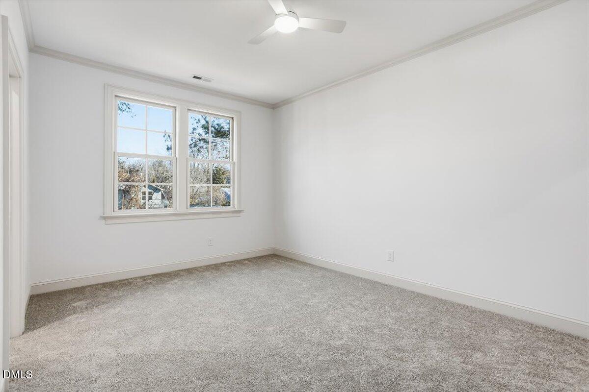 203 Baggett Avenue Raleigh, NC 27604 - Photo 26 of 45 an empty room with a window