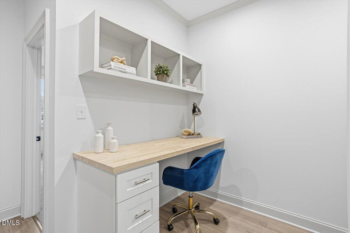 203 Baggett Avenue Raleigh, NC 27604 - Photo 33 of 45 a view of workspace with cabinets