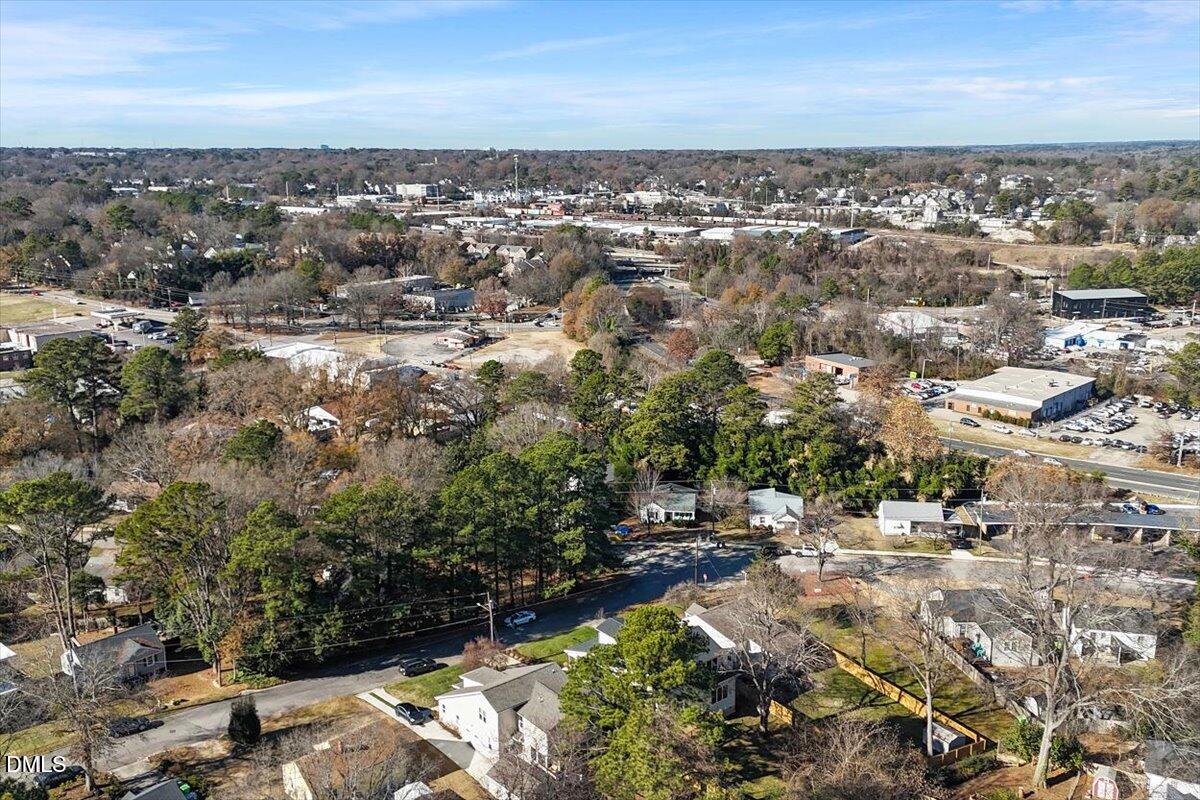 203 Baggett Avenue Raleigh, NC 27604 - Photo 42 of 45 an aerial view of residential building and trees around