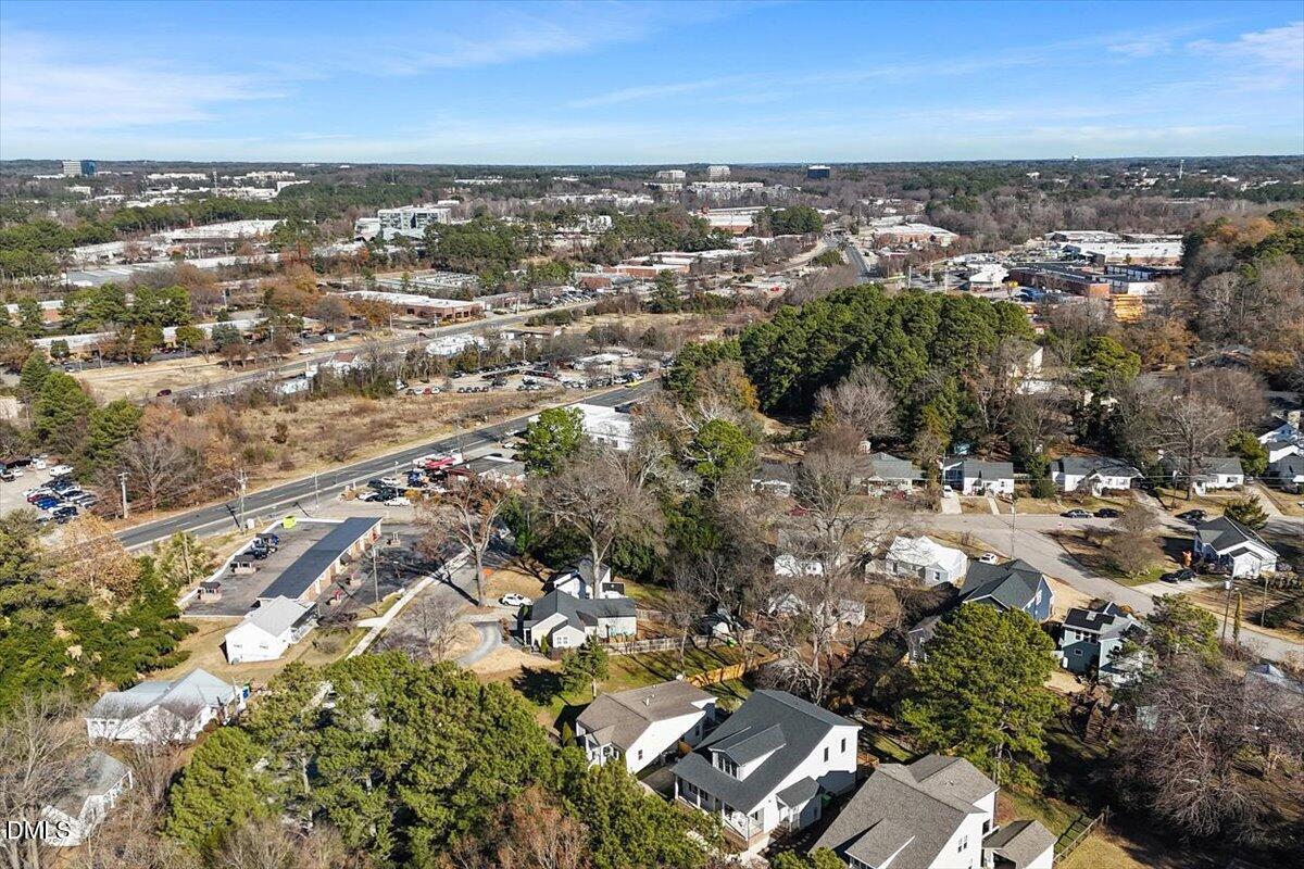 203 Baggett Avenue Raleigh, NC 27604 - Photo 43 of 45 an aerial view of residential building with parking space