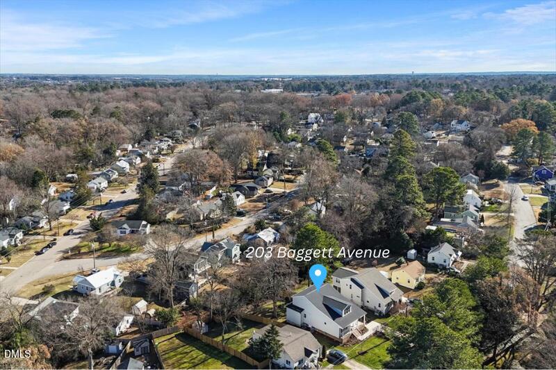 203 Baggett Avenue Raleigh, NC 27604 - Photo 51 of 52 an aerial view of a city with lots of residential buildings