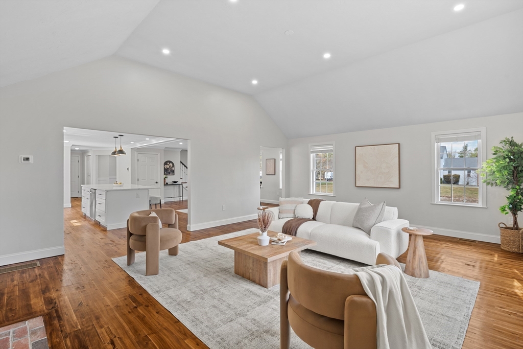 8 Virginia Avenue Sutton, MA 01590 - Photo 13 of 38 a living room with furniture and a wooden floor