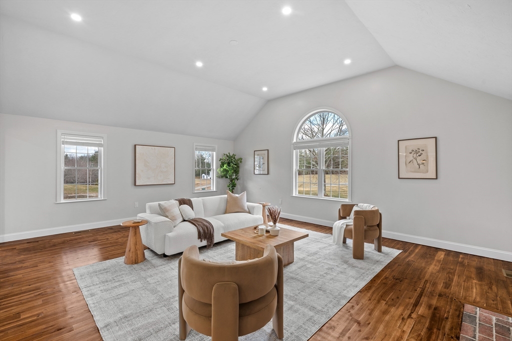 8 Virginia Avenue Sutton, MA 01590 - Photo 14 of 38 a living room with furniture two window and wooden floor