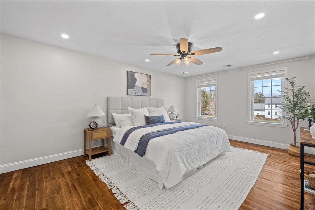 8 Virginia Avenue Sutton, MA 01590 - Photo 16 of 38 a spacious bedroom with a bed and a window