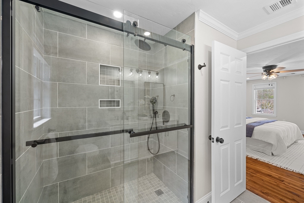 8 Virginia Avenue Sutton, MA 01590 - Photo 19 of 38 a bathroom with a glass shower door