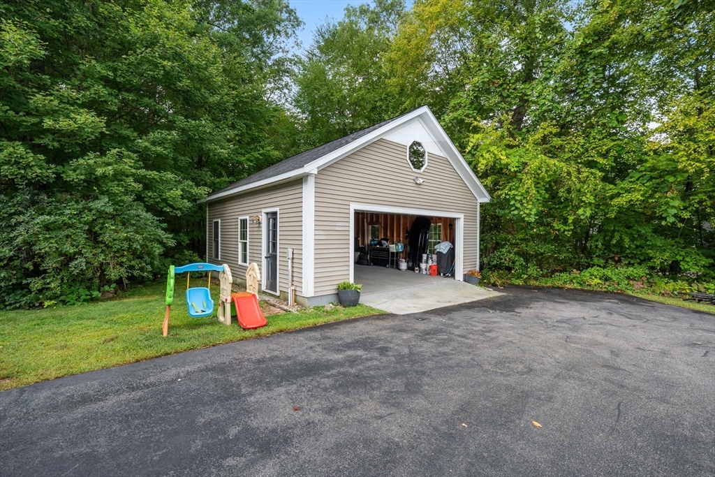 8 Virginia Avenue Sutton, MA 01590 - Photo 31 of 38 a view of a house with pool and yard