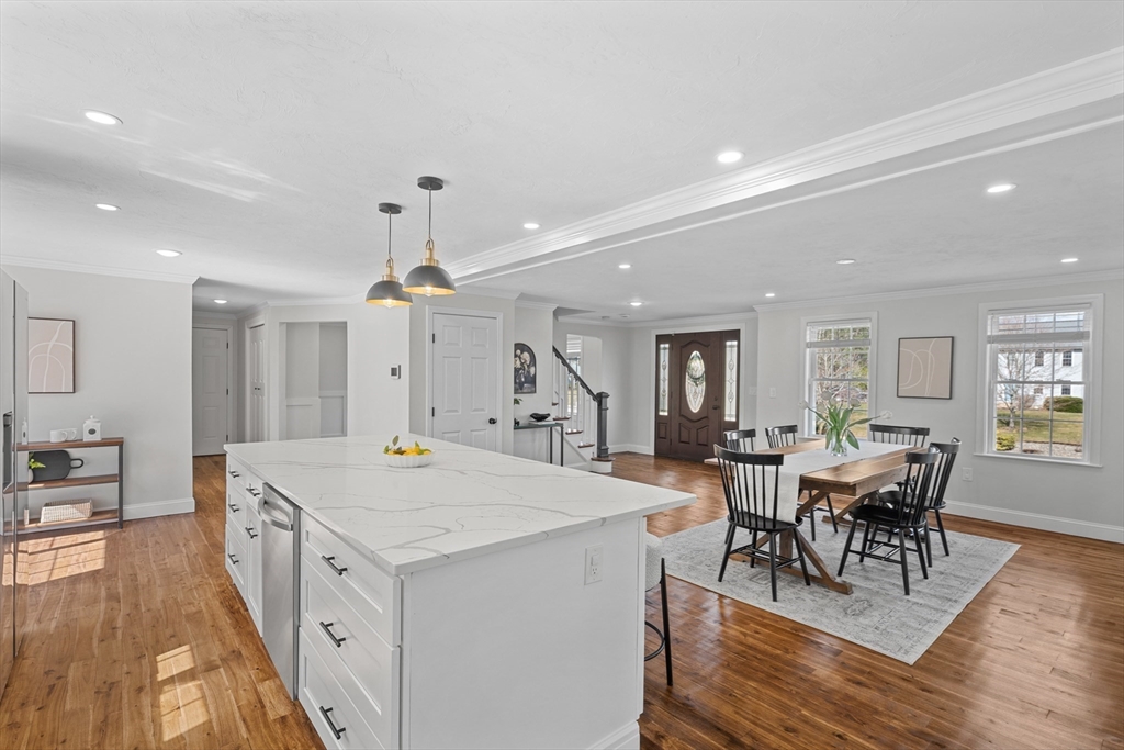 8 Virginia Avenue Sutton, MA 01590 - Photo 8 of 38 a view of a dining room with furniture window and wooden floor