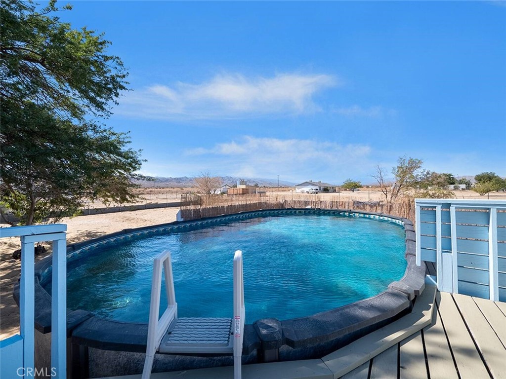 65585 4th Street South Joshua Tree, CA 92252 - Photo 1 of 27 a view of a balcony with an outdoor space
