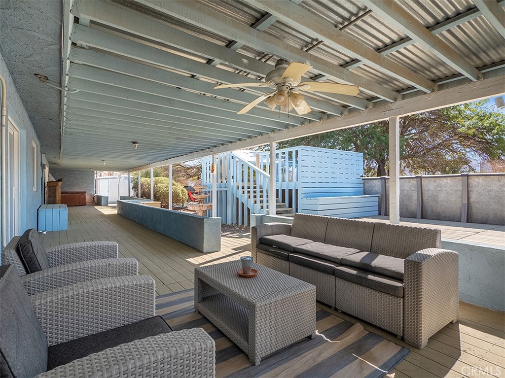 65585 4th Street South Joshua Tree, CA 92252 - Photo 25 of 27 a outdoor living space with furniture and a couch