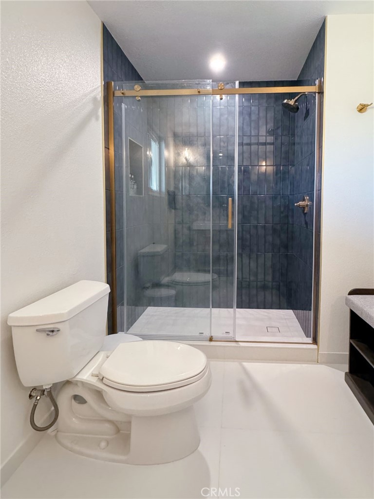65585 4th Street South Joshua Tree, CA 92252 - Photo 4 of 27 a bathroom with a toilet and a shower