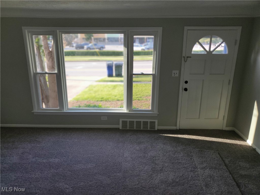 7007 Biddulph Road Brooklyn, OH 44144 - Photo 2 of 16 Foyer with carpet and baseboards