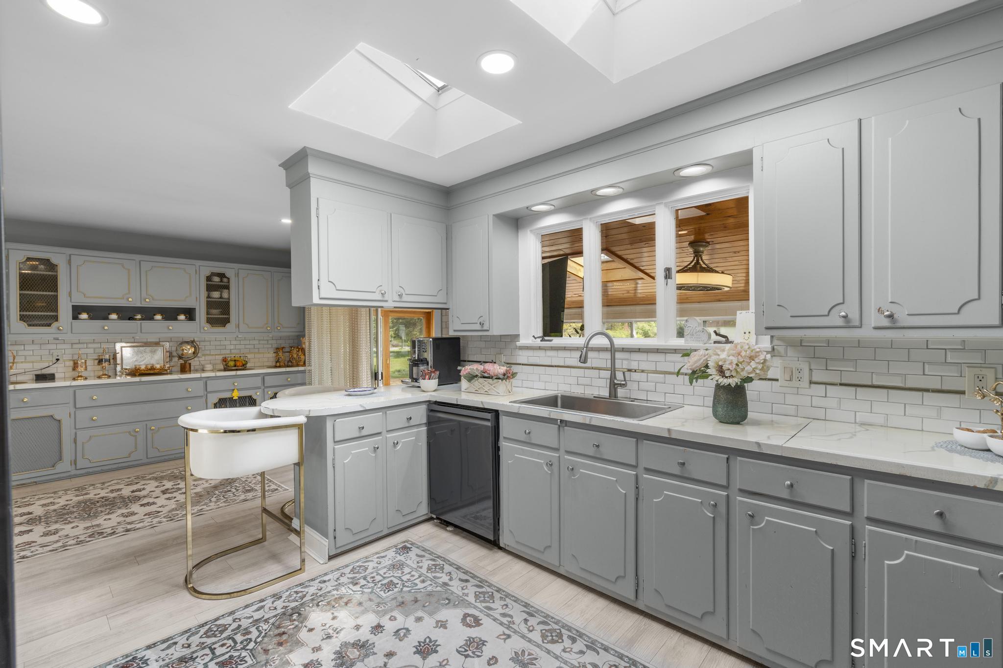 15 Pent Road Deep River, CT 06417 - Photo 11 of 36 a kitchen with a sink and cabinets
