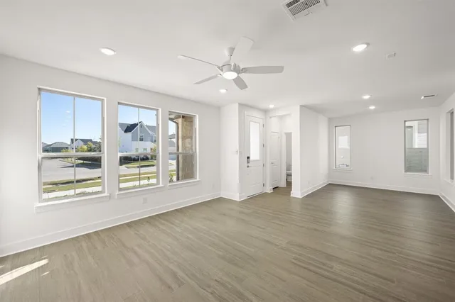 a view of kitchen with cabinets and stainless steel appliances