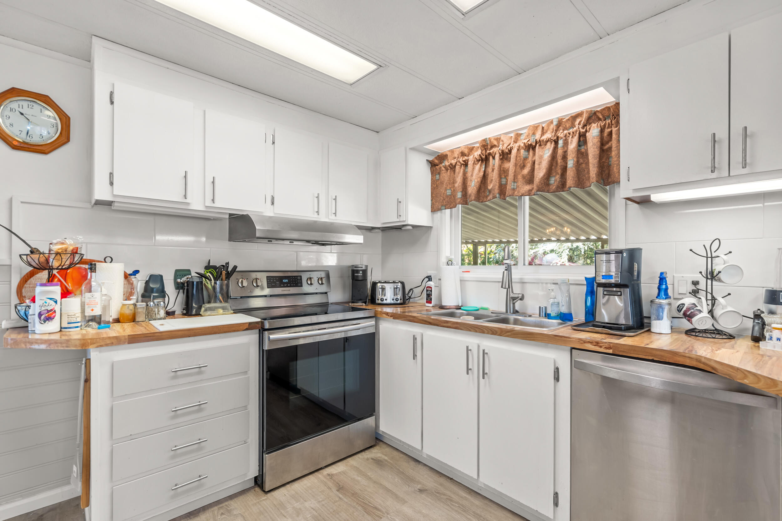 6850 Downing Road, Unit SPC 24 Central Point, OR 97502 - Photo 7 of 26 a kitchen with a sink cabinets and window