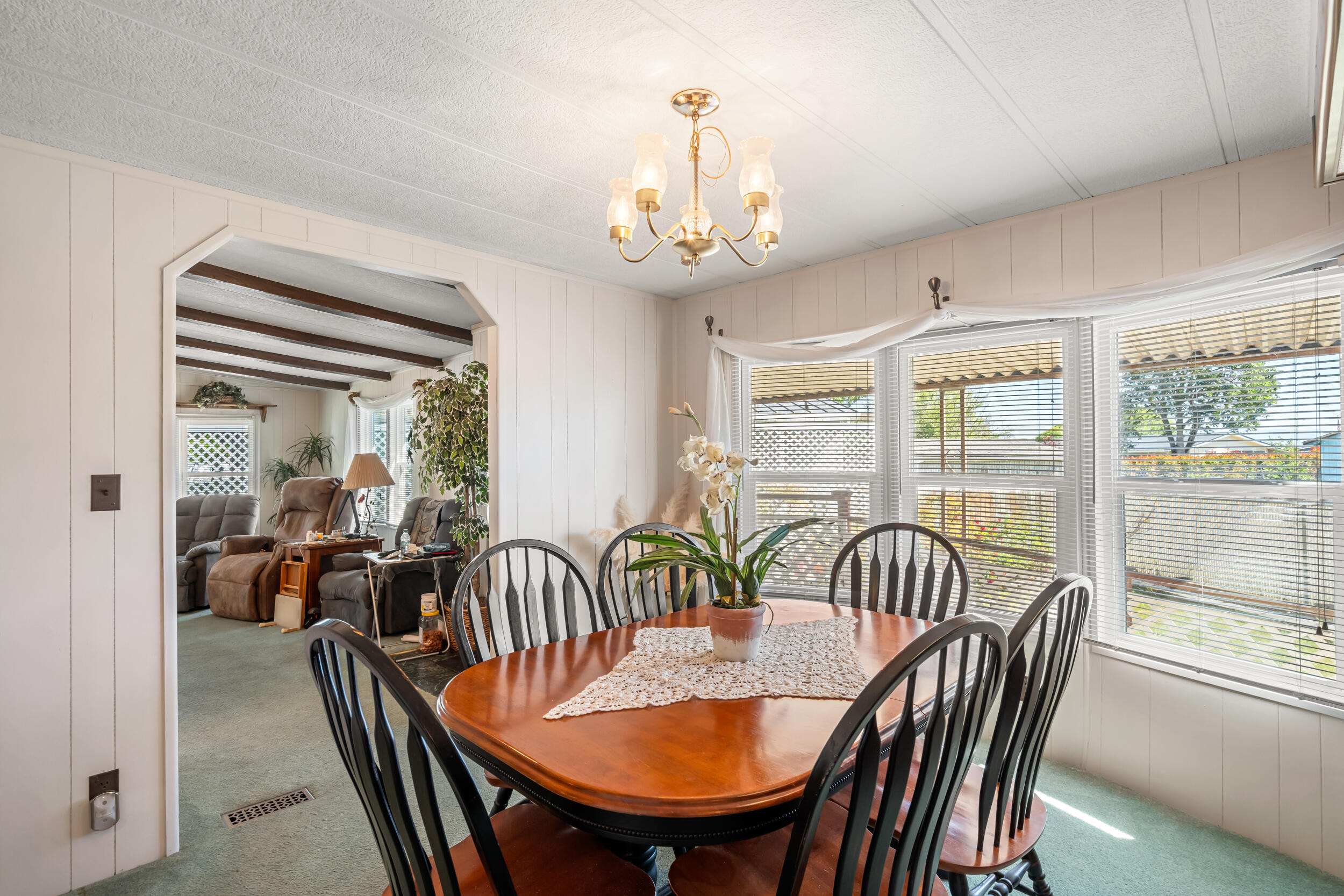 6850 Downing Road, Unit SPC 24 Central Point, OR 97502 - Photo 8 of 26 a view of a dining room with furniture window and outside view