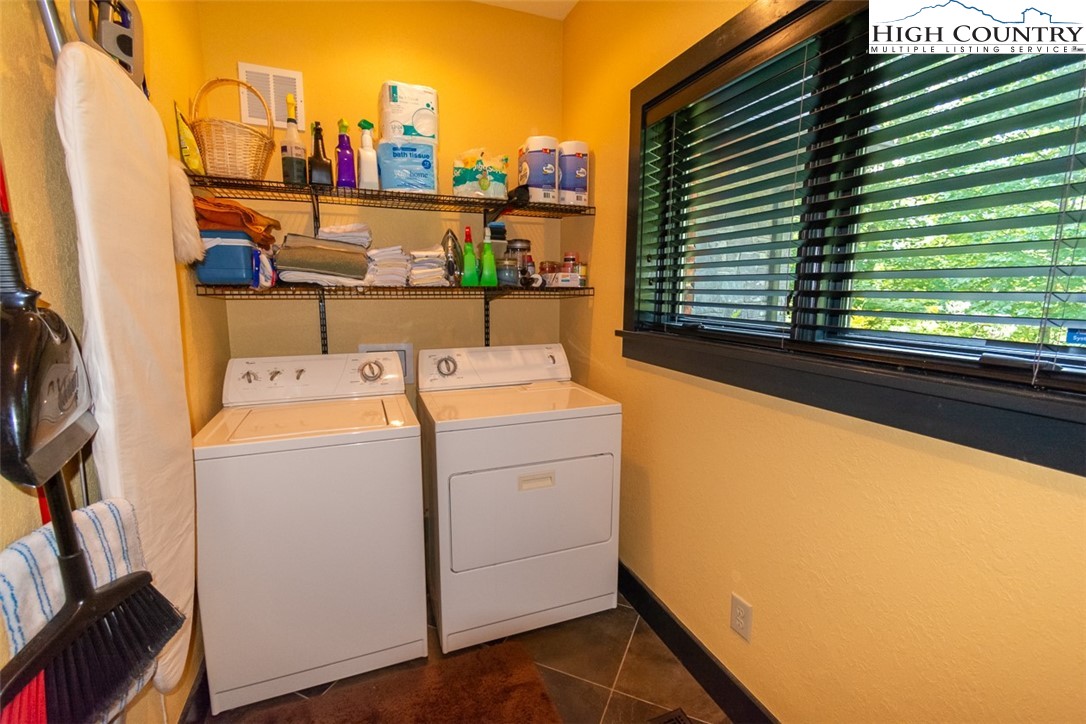 572 Stonegate Lane Creston, NC 28615 - Photo 11 of 48 a utility room with dryer and washer