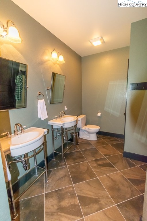 572 Stonegate Lane Creston, NC 28615 - Photo 27 of 48 a outdoor space with lots of tables a mirror and a couch