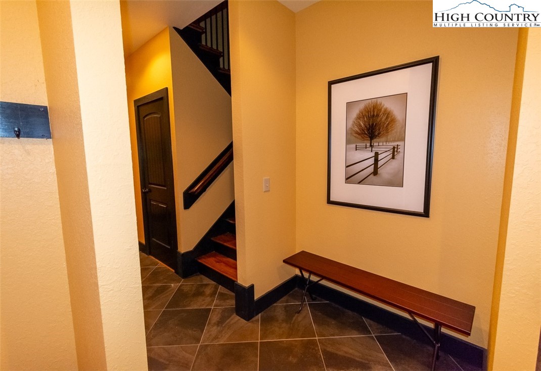 572 Stonegate Lane Creston, NC 28615 - Photo 9 of 48 a picture of stairs