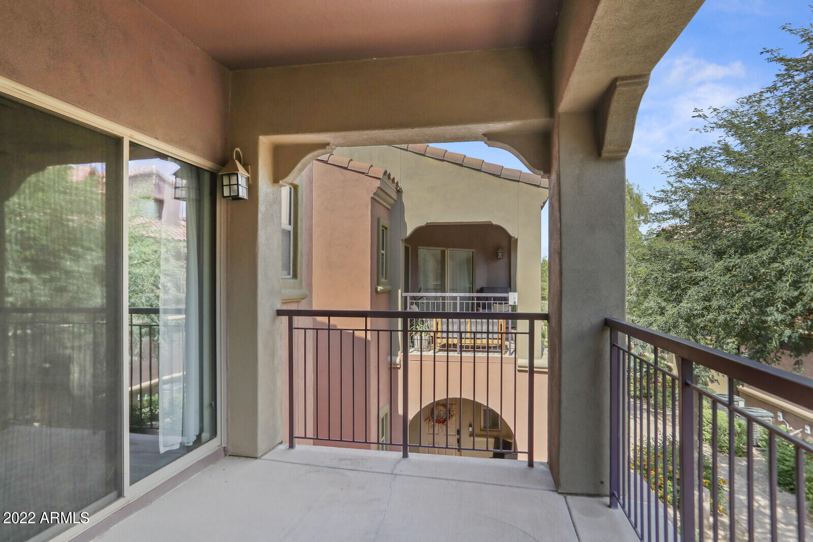 3935 East Rough Rider Road, Unit 1108 Phoenix, AZ 85050 - Photo 28 of 46 Corner patio