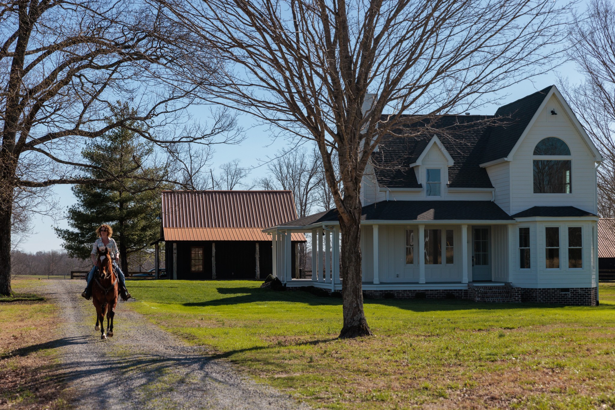7776 Lampley Road Primm Springs, TN 38476 - Photo 13 of 50 a front view of a house with a yard