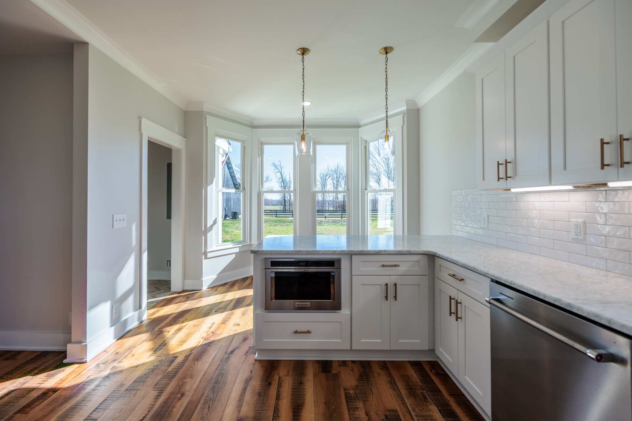 7776 Lampley Road Primm Springs, TN 38476 - Photo 22 of 50 a kitchen that has a sink and a stove