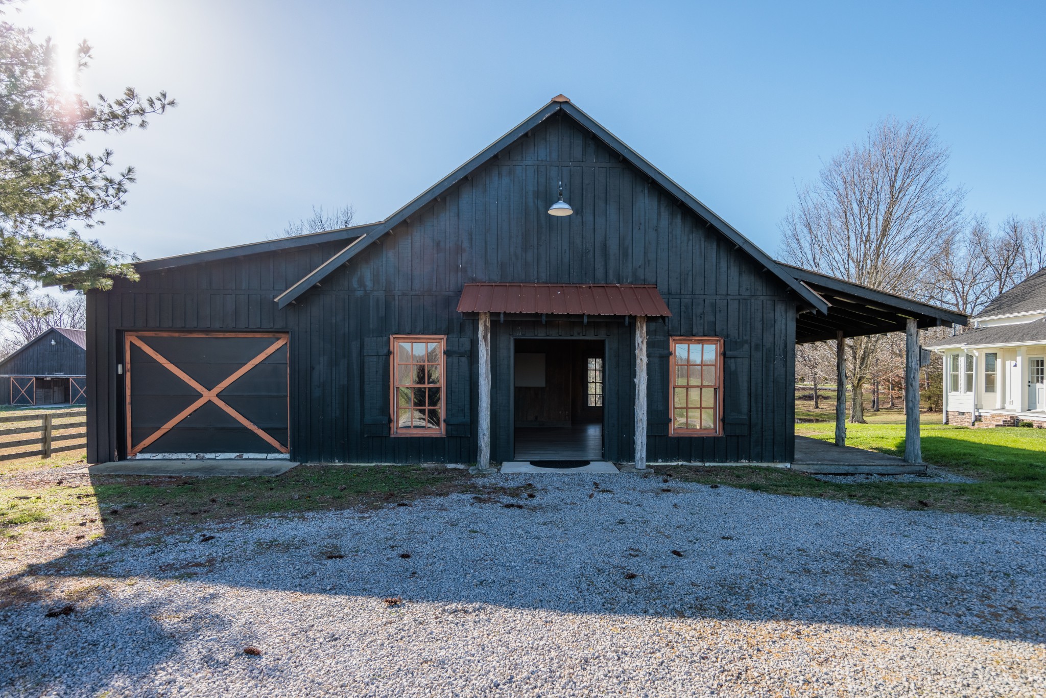7776 Lampley Road Primm Springs, TN 38476 - Photo 23 of 50 a front view of a house with garden