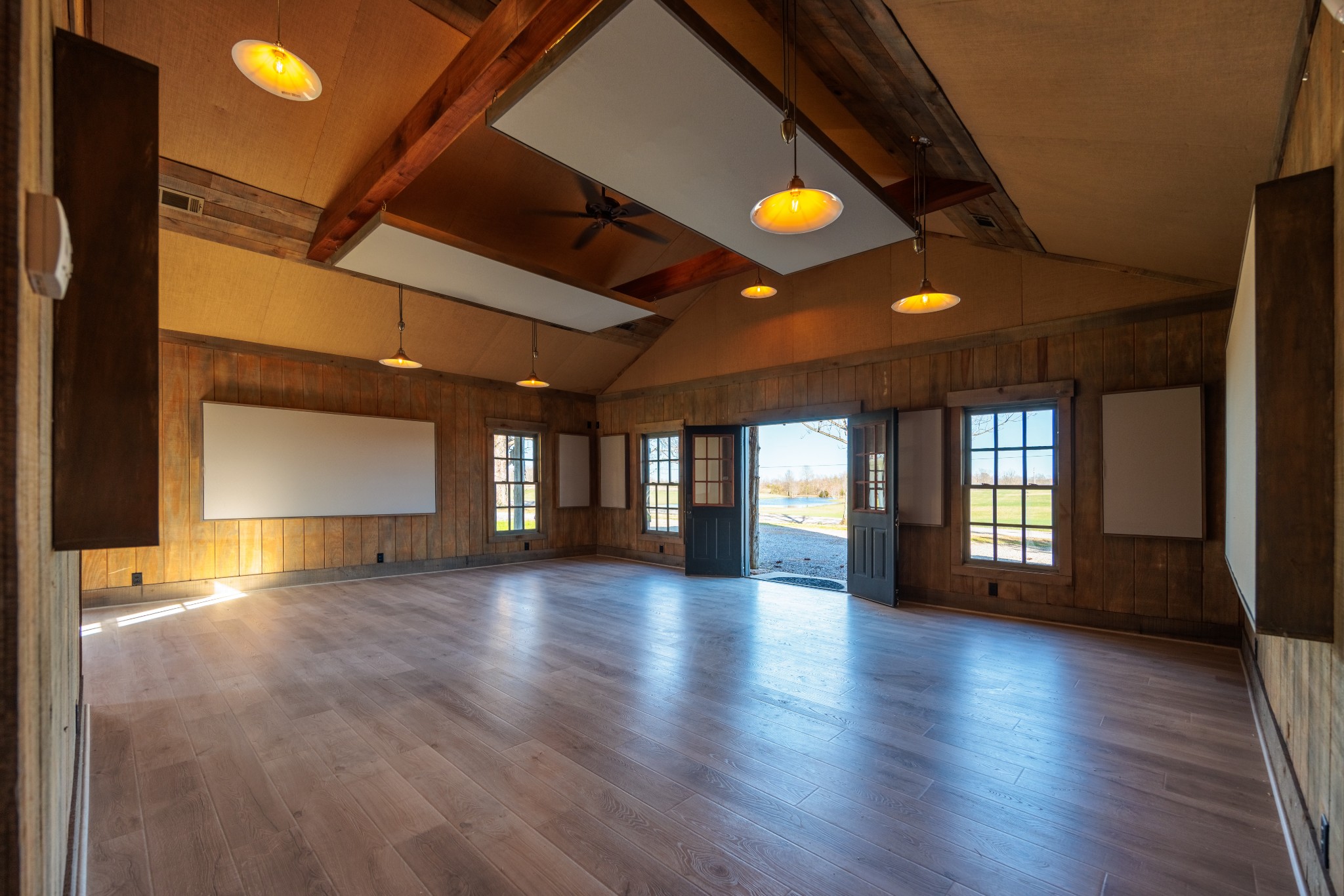 7776 Lampley Road Primm Springs, TN 38476 - Photo 26 of 50 an empty room with window and wooden floor