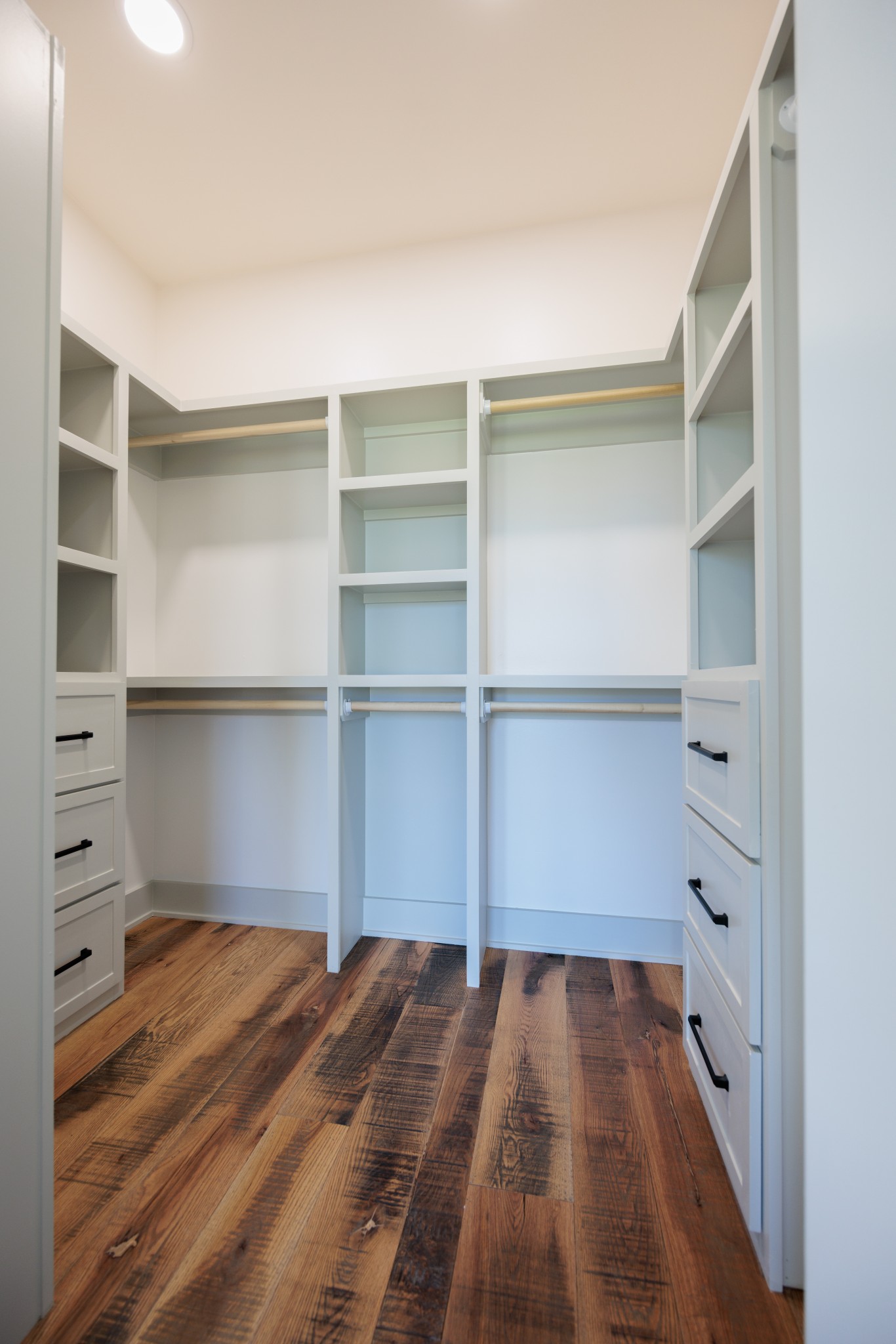 7776 Lampley Road Primm Springs, TN 38476 - Photo 31 of 50 a view of walk in closet with empty racks