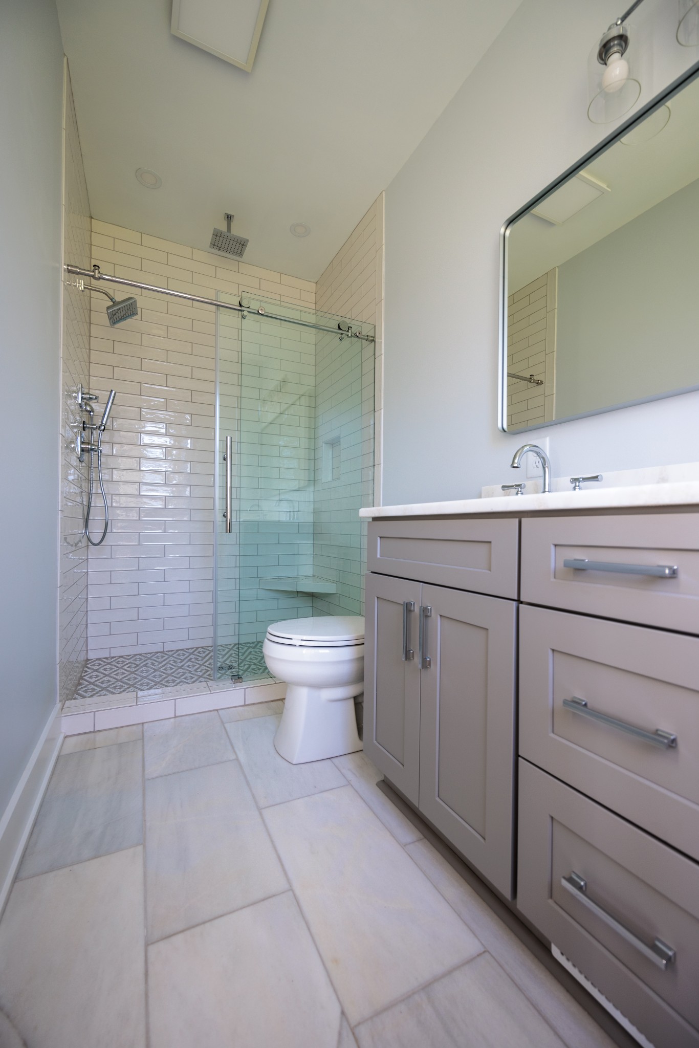 7776 Lampley Road Primm Springs, TN 38476 - Photo 33 of 50 a bathroom with a sink a toilet and shower