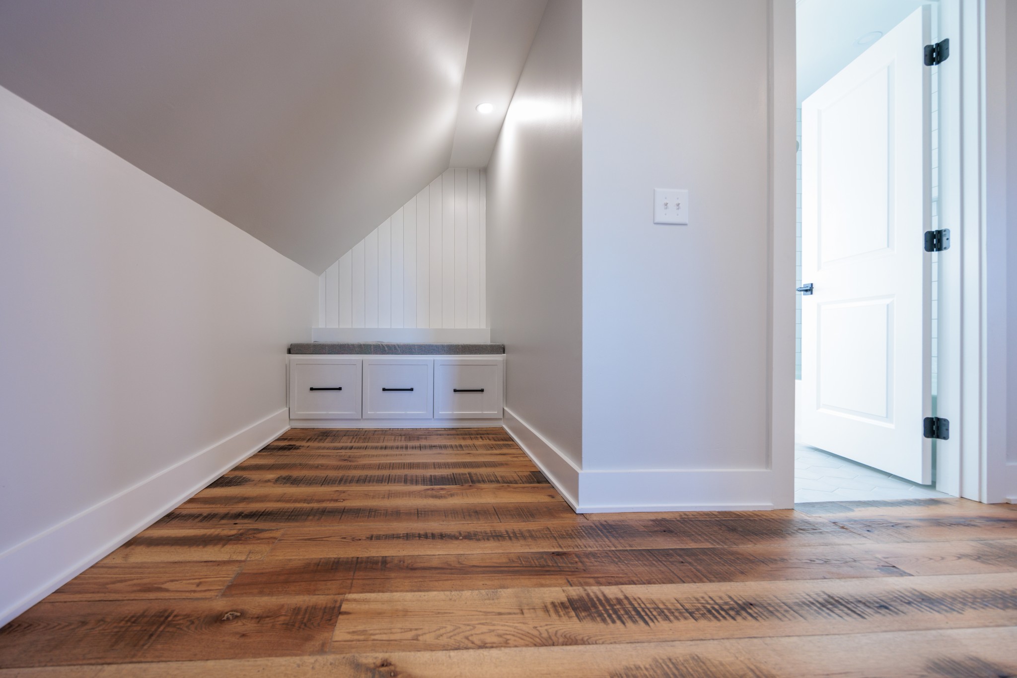 7776 Lampley Road Primm Springs, TN 38476 - Photo 37 of 50 a view of a hallway with wooden floor