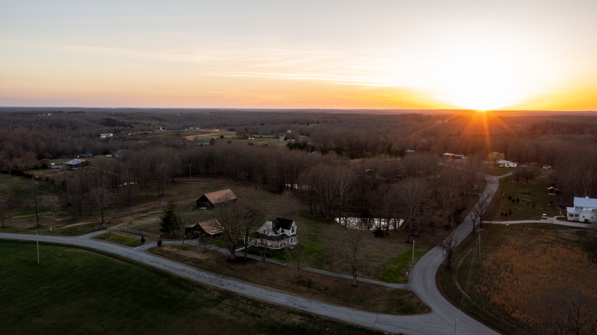 7776 Lampley Road Primm Springs, TN 38476 - Photo 7 of 50 an aerial view of a house with mountain view