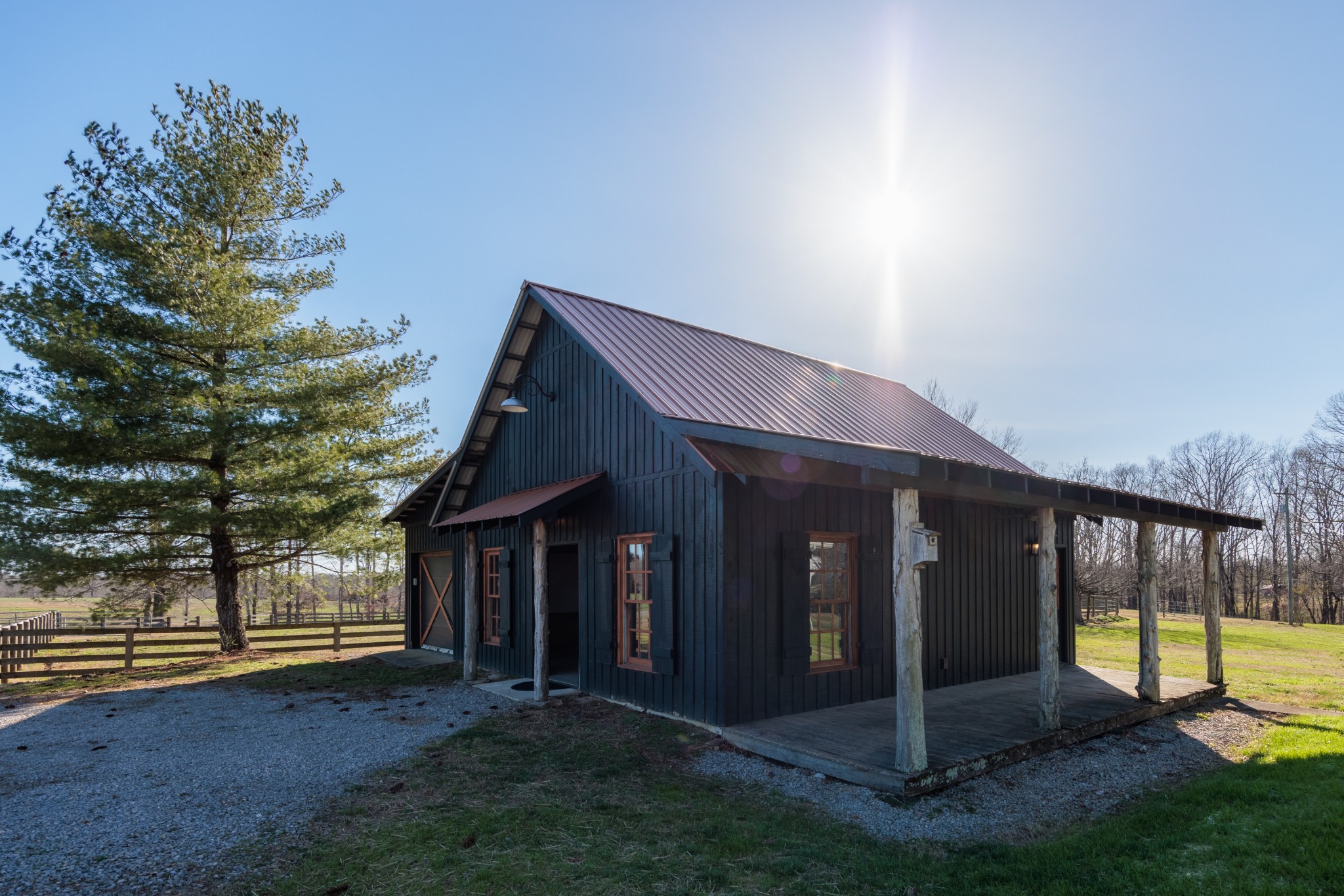 7776 Lampley Road Primm Springs, TN 38476 - Photo 10 of 50 a view of a house with a yard and roof