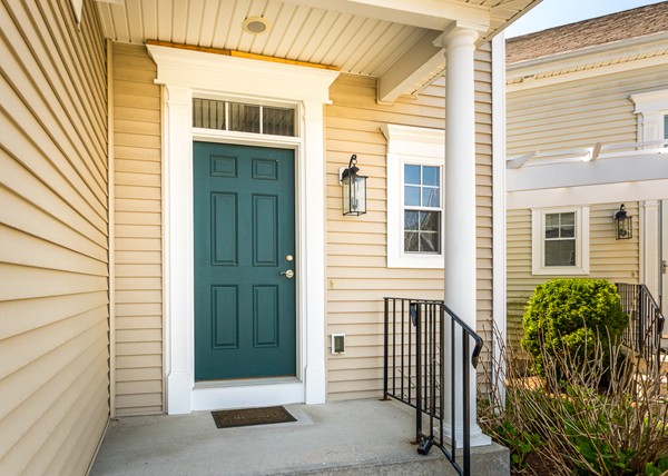16 Bartlett Way, Unit 3 Waltham, MA 02452 - Photo 2 of 30 a view of entrance door of a house