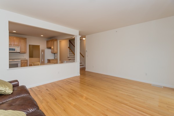 16 Bartlett Way, Unit 3 Waltham, MA 02452 - Photo 8 of 30 a view of an empty room and window